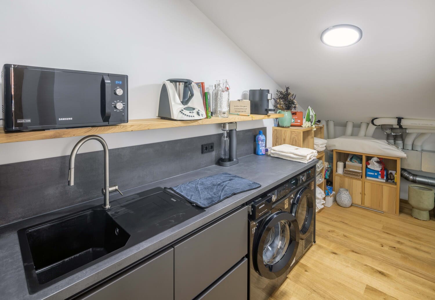 Mehrfamilien Holzhaus in Übersee, Hauswirtschaftsraum UG