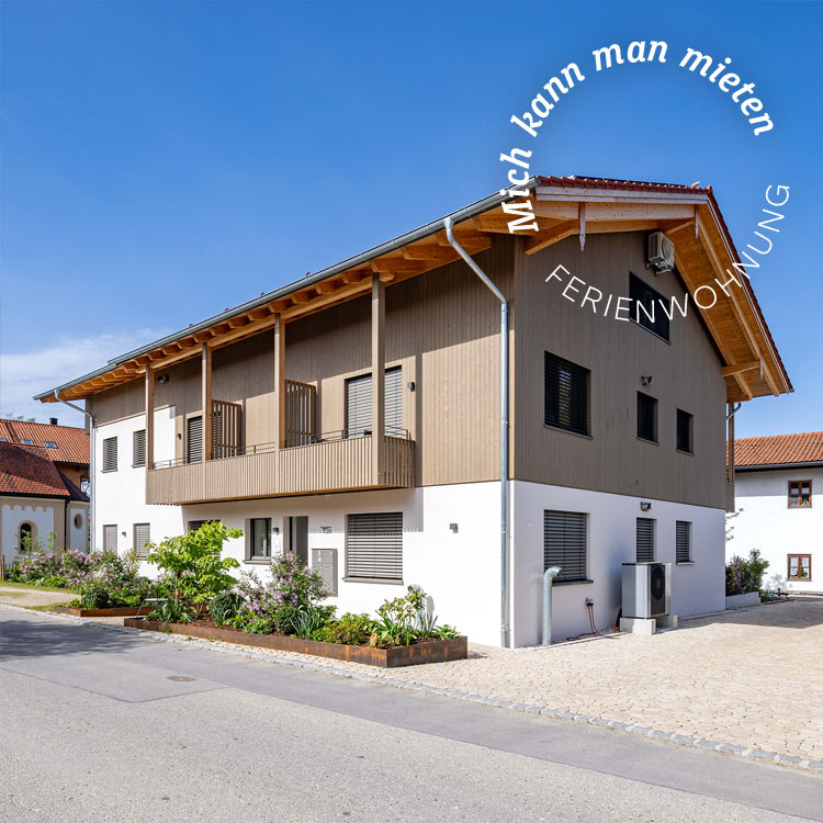 Mehrfamilien-Holzhaus in Holzständerbau in Übersee